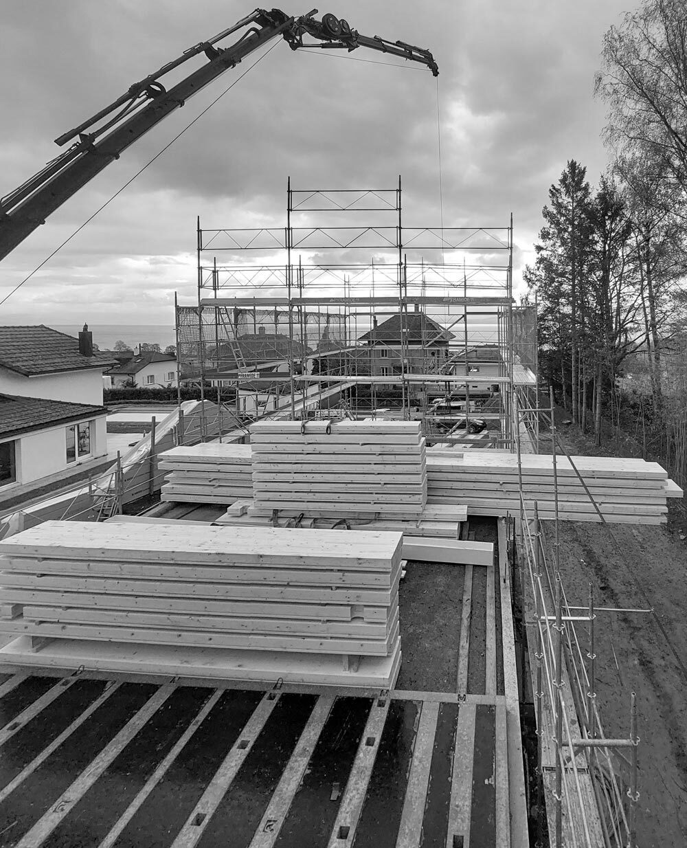 Maisons mitoyennes séparées par deux garages CSDK villa individuelle construction bursinel chantier 5 1000x1234 - Maisons mitoyennes séparées par deux garages - CSDK villa individuelle construction bursinel chantier 5 1000x1234